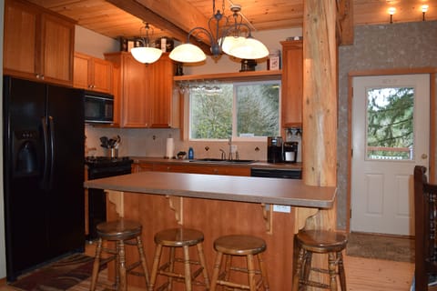 Seating for 4 more on the island.
Light efficient kitchen.