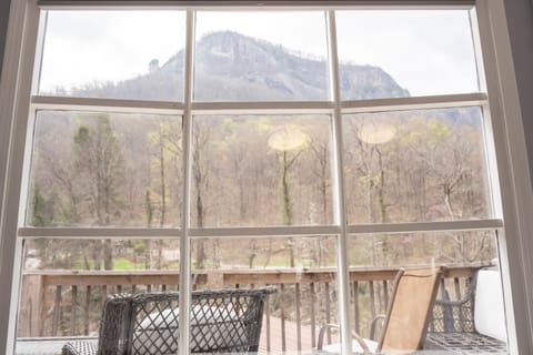 Large window in Bedroom 1 overlooking the beautiful Chimney Rock mountainscape!