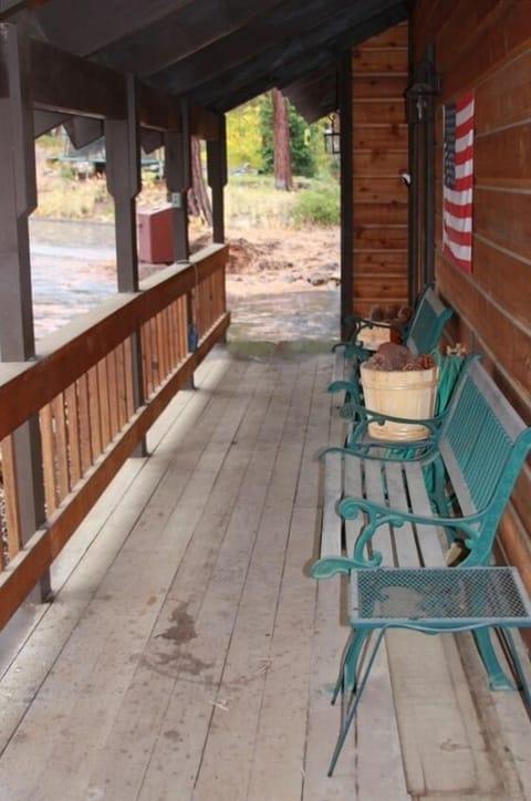 Inviting covered front porch - we hope to see you here soon!!