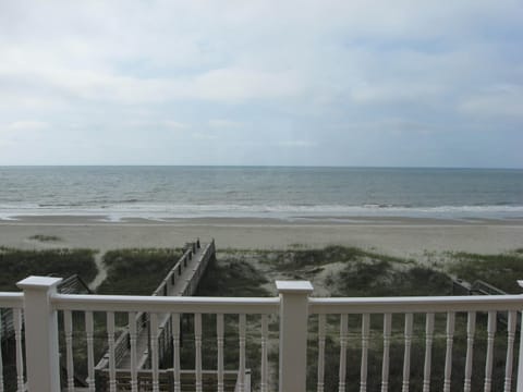 View of beach in front of the house.  Taken from the upper deck.