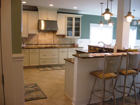Spacious kitchen with all the major appliances &  supplies for cooking & baking.