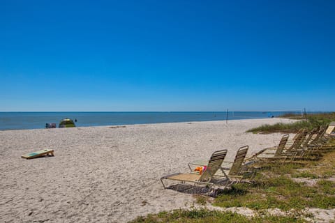 On the beach, sun loungers, beach towels