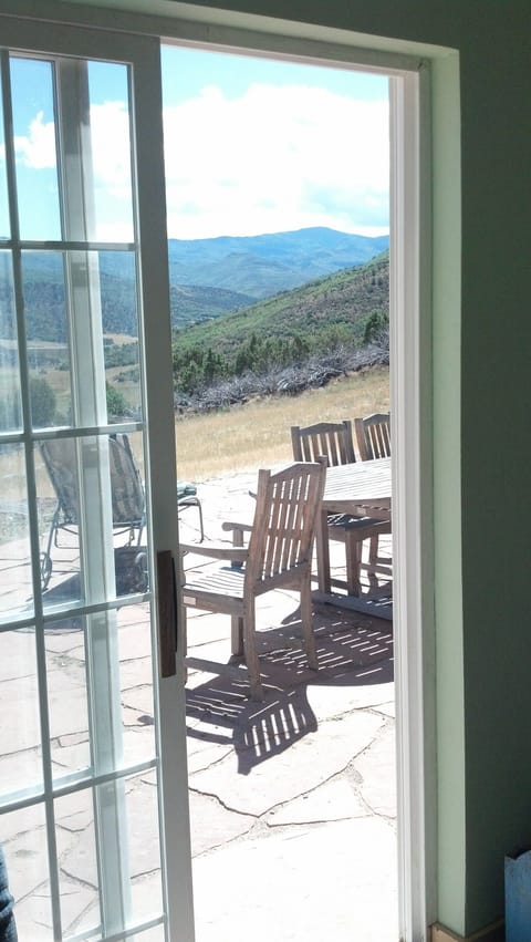 Enjoy a walk out to grade patio of the sunroom for your breakfast