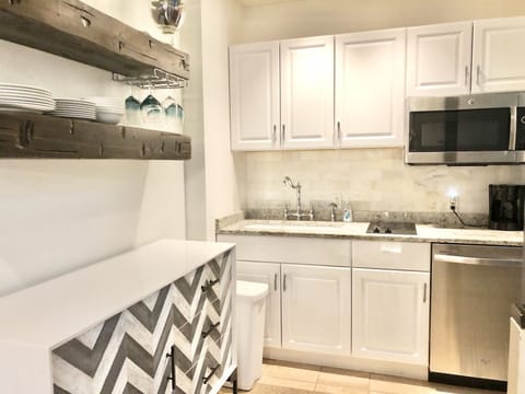 Downstairs additional kitchenette and full sized drink fridge