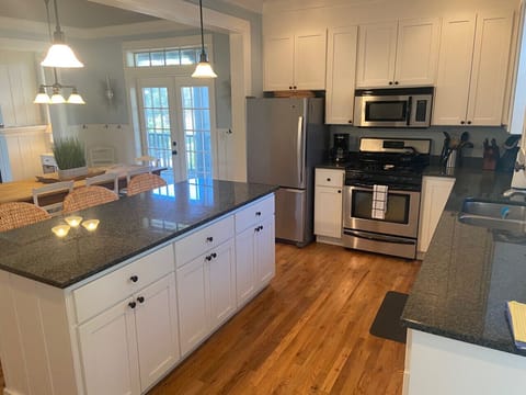 Fully equipped kitchen for seamless meal preparation.