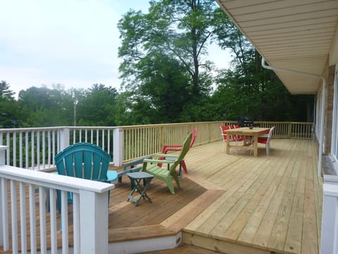 Huge deck in the front of the house facing the lake