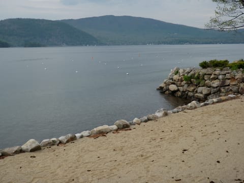 Private beach for Whittemore Shores residents, looking at Cardigan Mtn.