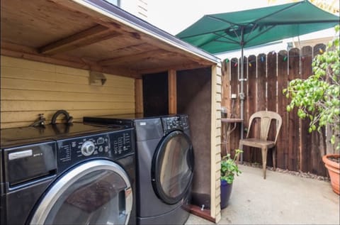 Outside unit washer and dryer that is not shared with any other unit 
