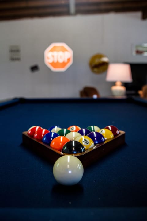 Game room w/pool table, poker/gaming table, shuffleboard and dart board!