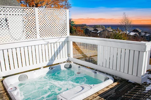 Hot tub has 180° view of Lake Superior and is available all year