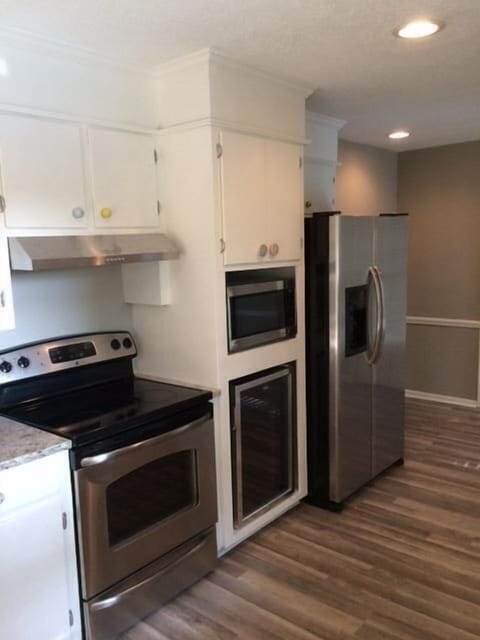New stainless steel appliances and beverage cooler