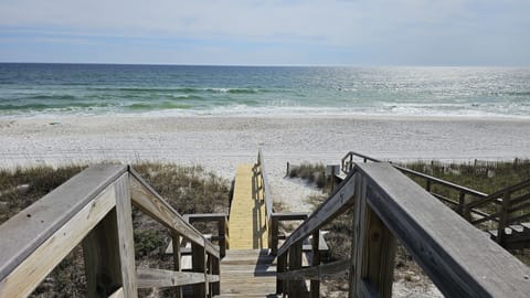 On the beach, sun loungers, beach towels