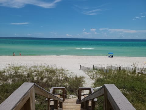 On the beach, sun loungers, beach towels