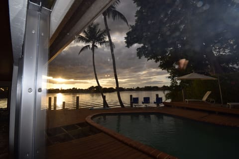 Outdoor pool, a heated pool, sun loungers