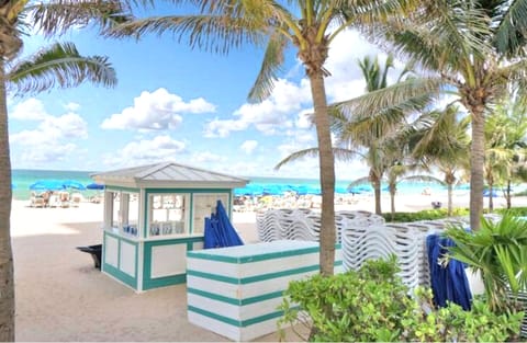 On the beach, sun loungers, beach towels