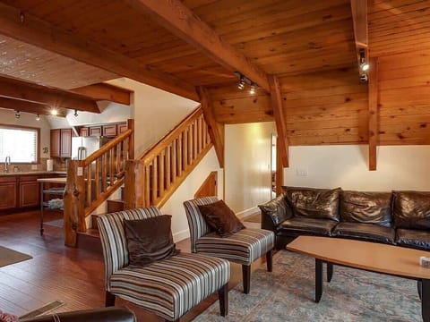 Open living room with LCD TV and Romantic Fireplace