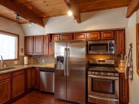 Granite kitchen with nice Stainless Steel Appliances.