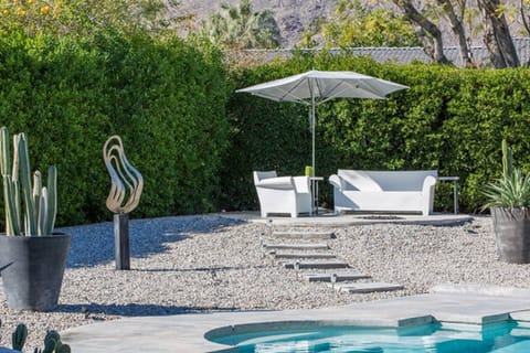 Backyard seating area w/fire pit.