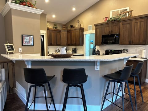 Never be secluded from the group as you prepare meals in fully stocked kitchen