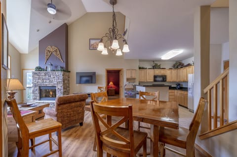 Unit seats 14 for meals (7 at dining table, 4 at flip top table, 3 at counter).