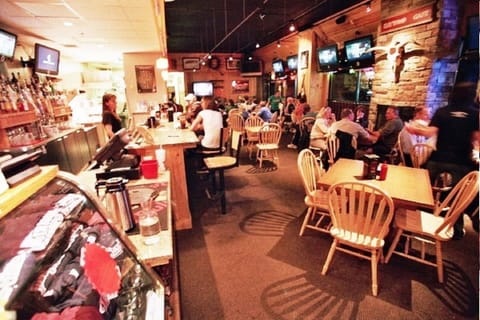 Haywood Sports Cafe (12 flat screen TV's + kids video games). Open 7AM-10PM.