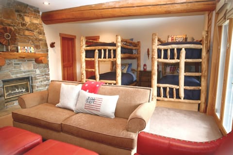 Kids korner is the bunkroom with private bathroom, fireplace and living area.