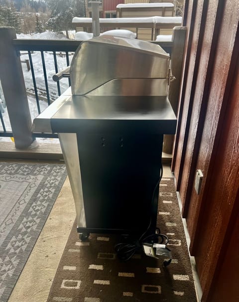 Electric BBQ grill on the deck.