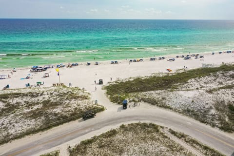 On the beach, sun loungers, beach towels