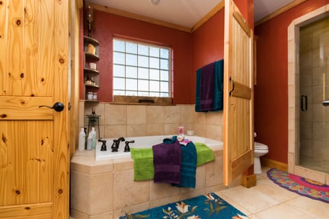 Combined shower/tub, hair dryer, towels, soap