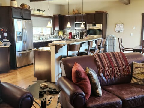 Kitchen with a breakfast bar and stools