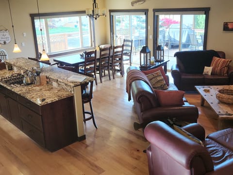 Living, dining and kitchen on the lower level with a view!