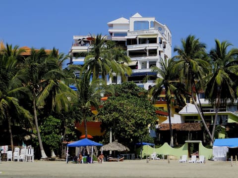 Building / Unit from the Beach (dark blue awnings at right)