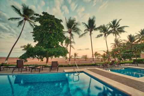 you can relax around around our private pool along the beach