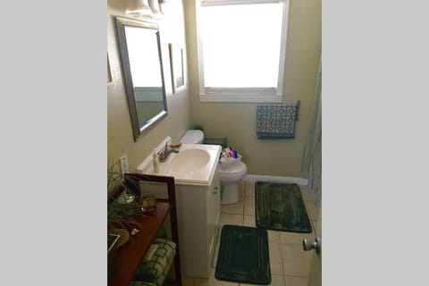 Combined shower/tub, hair dryer, towels, soap