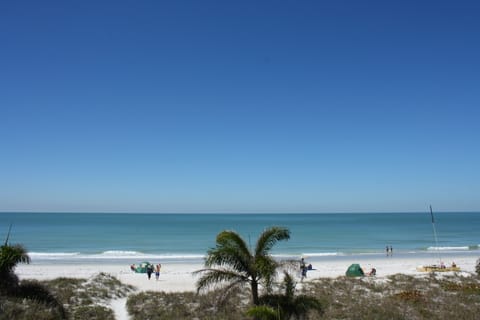 On the beach, sun loungers, beach towels