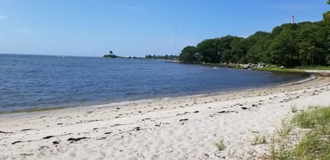 On the beach, sun loungers, beach towels