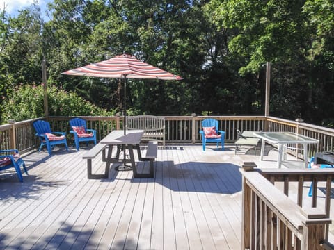 Deck just off the Kitchen.  Huge Sunny And Great for all post beach activities. 