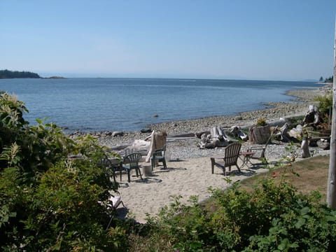 On the beach, sun loungers, beach towels