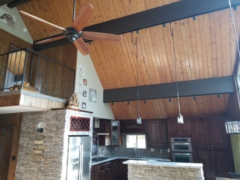 Dramatic high ceilings and floor to ceiling windows