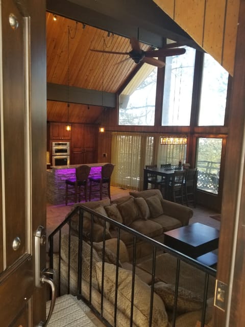 Floor to Ceiling Windows,  Knotty Pine paneling and Pine Beam Ceilings. Welcome!