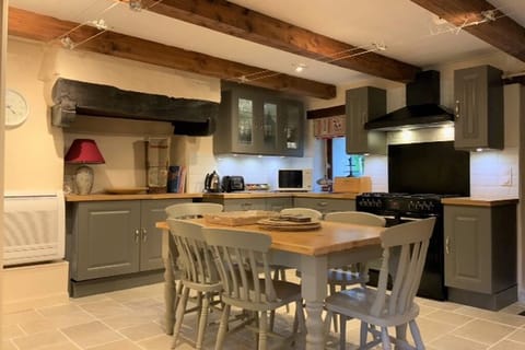 Priory gite's country kitchen with range oven