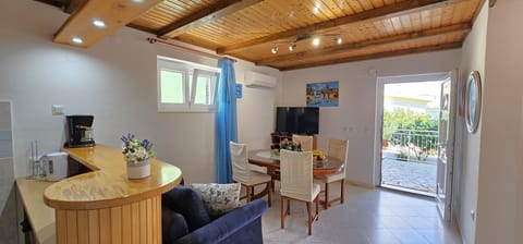 Apt Olive open plan living and dining area 