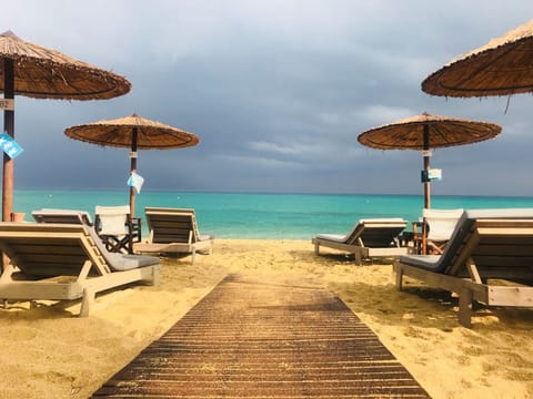 Beach nearby, sun loungers, beach towels