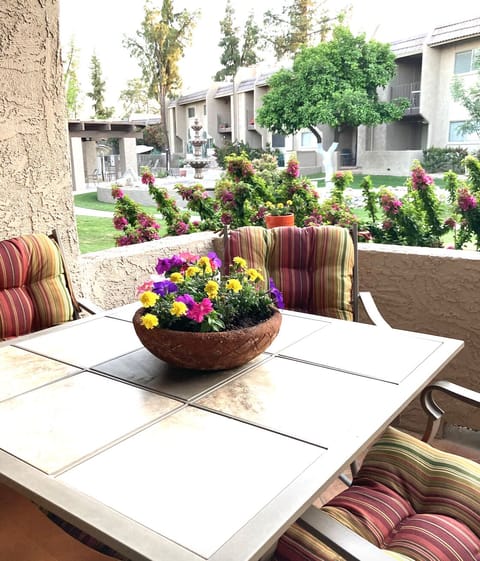 Beautiful outdoor patio with seating for 4, glorious views of fountain/courtyard