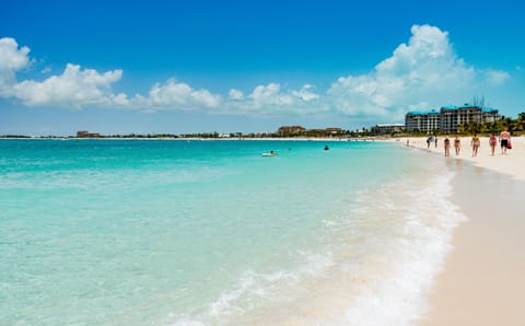 On the beach, sun loungers, beach towels