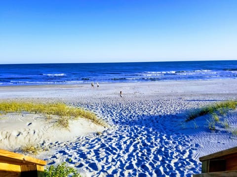 On the beach, sun loungers