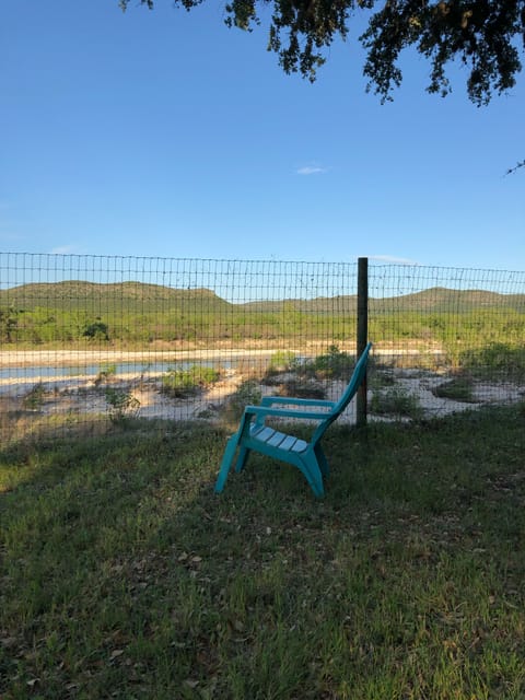 The Nueces River is just below the fence line with private access.