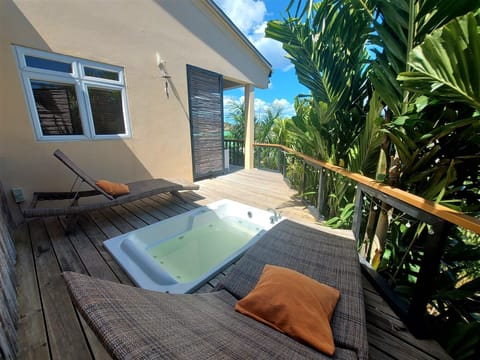 Enjoy the view from the outside whirlpool tub on your private sun deck