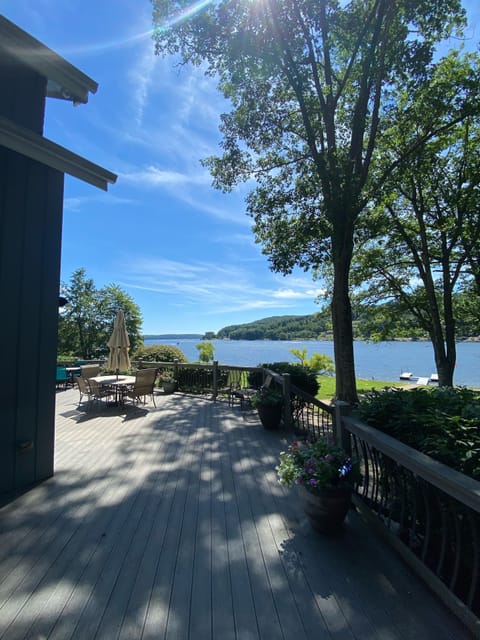 Rear deck with amazing view of the lake and the pathway to the private dock
