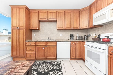 Kitchen is stocked with dishes, cooking, baking and meal prep gear. All standard large and small appliances included. Guests must provide their own food, drinks, spices, and condiments.